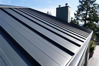 Close view of a residential standing seam metal roof